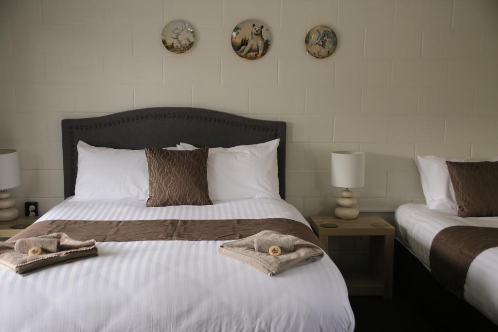 Postel nebo postele na pokoji v ubytování Mackenzie Motels