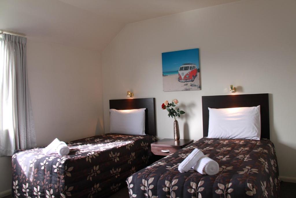 Postel nebo postele na pokoji v ubytování Alcala Motor Lodge
