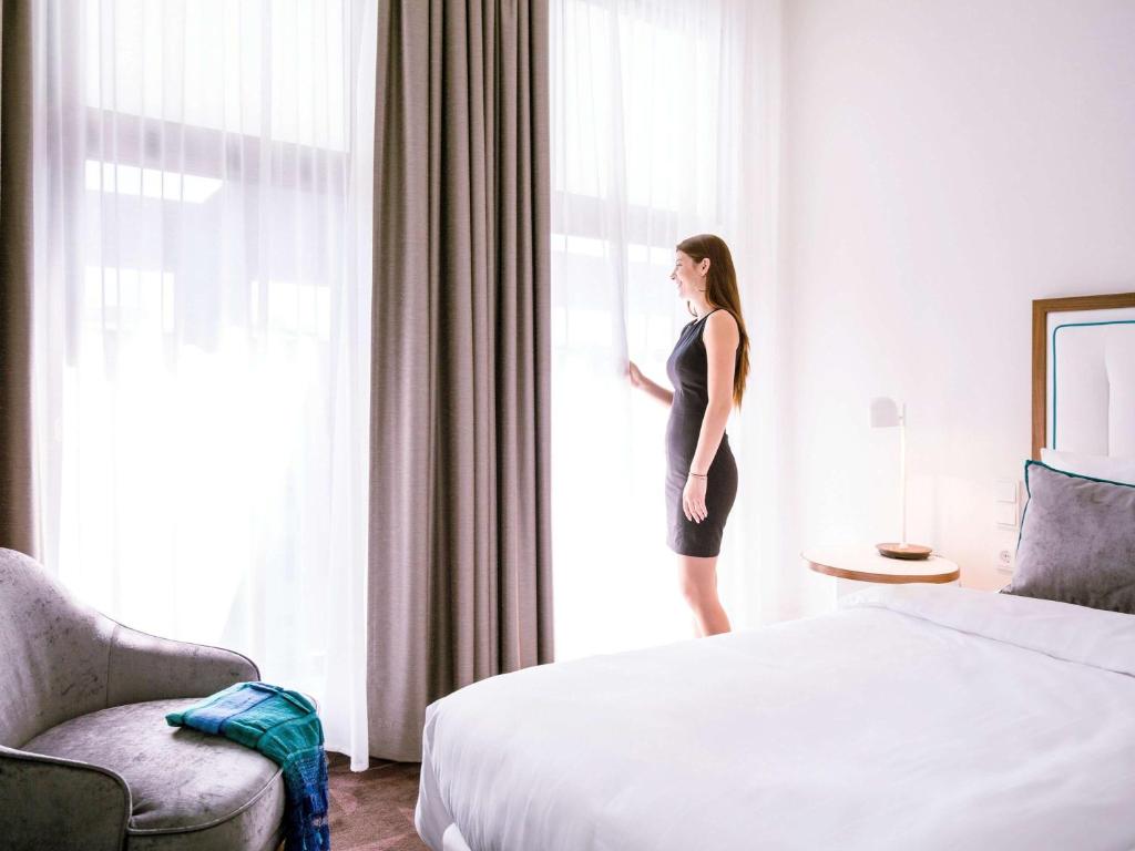 Ein Bett oder Betten in einem Zimmer der Unterkunft Mercure Hotel MOA Berlin