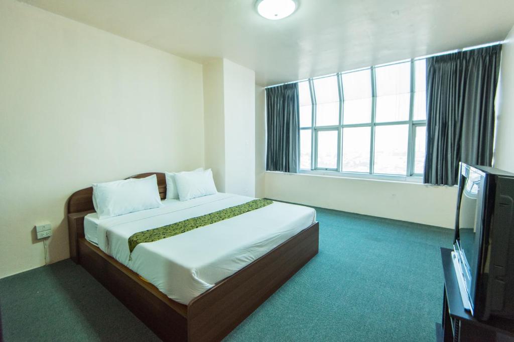 En eller flere senge i et værelse på King Royal 2