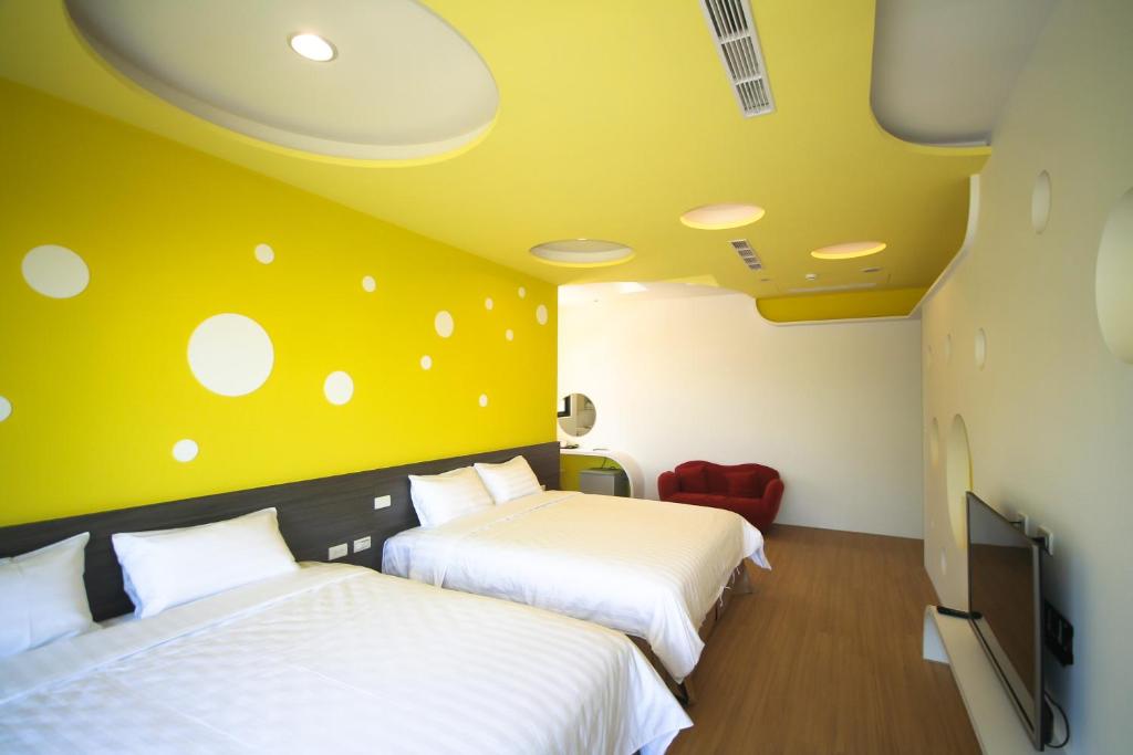 Postel nebo postele na pokoji v ubytování Colorful Homestay