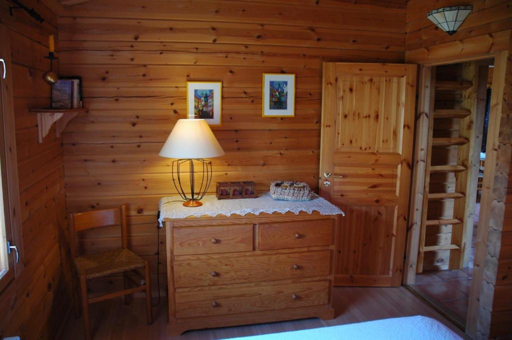 Postel nebo postele na pokoji v ubytování Chalet Rouge Sorbier