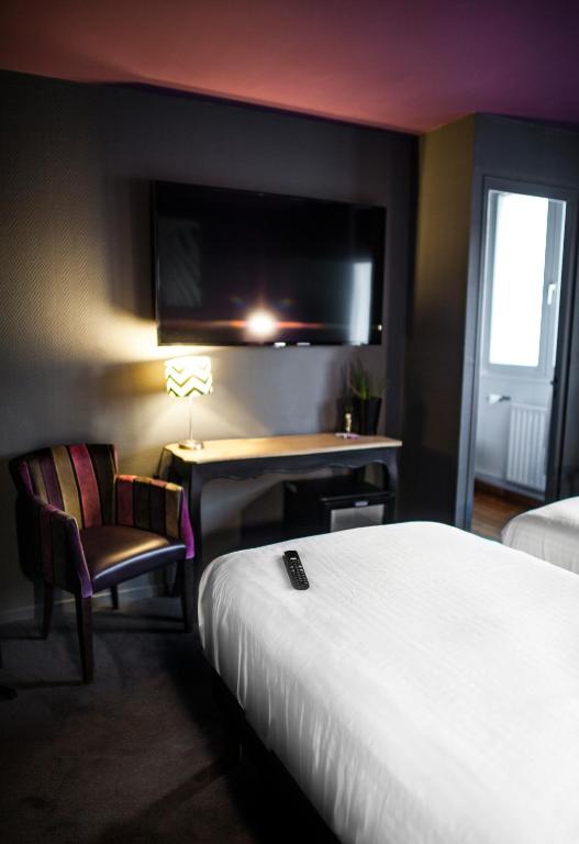 Postel nebo postele na pokoji v ubytování Cit'Hotel B Hotel Brasserie