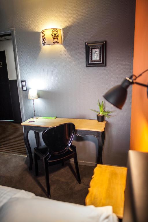 Postel nebo postele na pokoji v ubytování Cit'Hotel B Hotel Brasserie