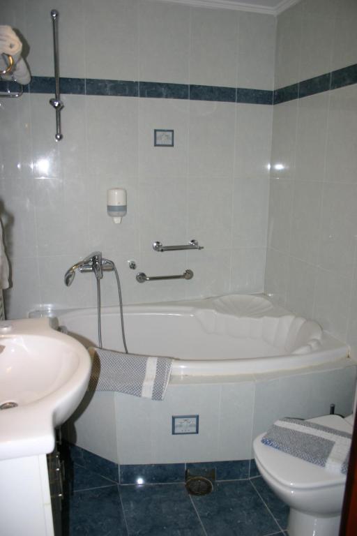 Koupelna v ubytování Petit Palais Hotel