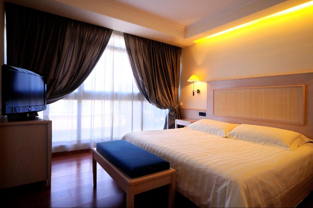 Postel nebo postele na pokoji v ubytování Best Western Hotel Globus