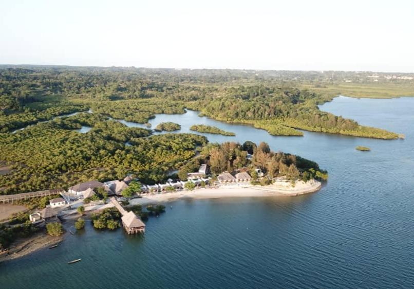 an aerial view of an island in a body of water at Pemba Misali Sunset Beach in Wesha