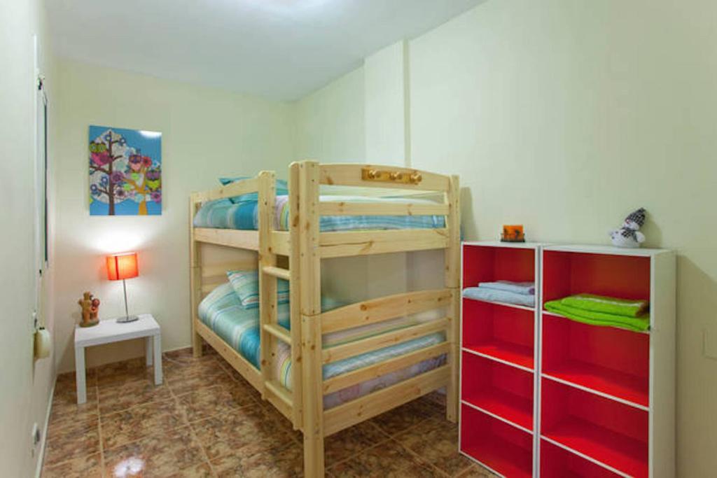Postel nebo postele na pokoji v ubytování Apartment Llavaneres I