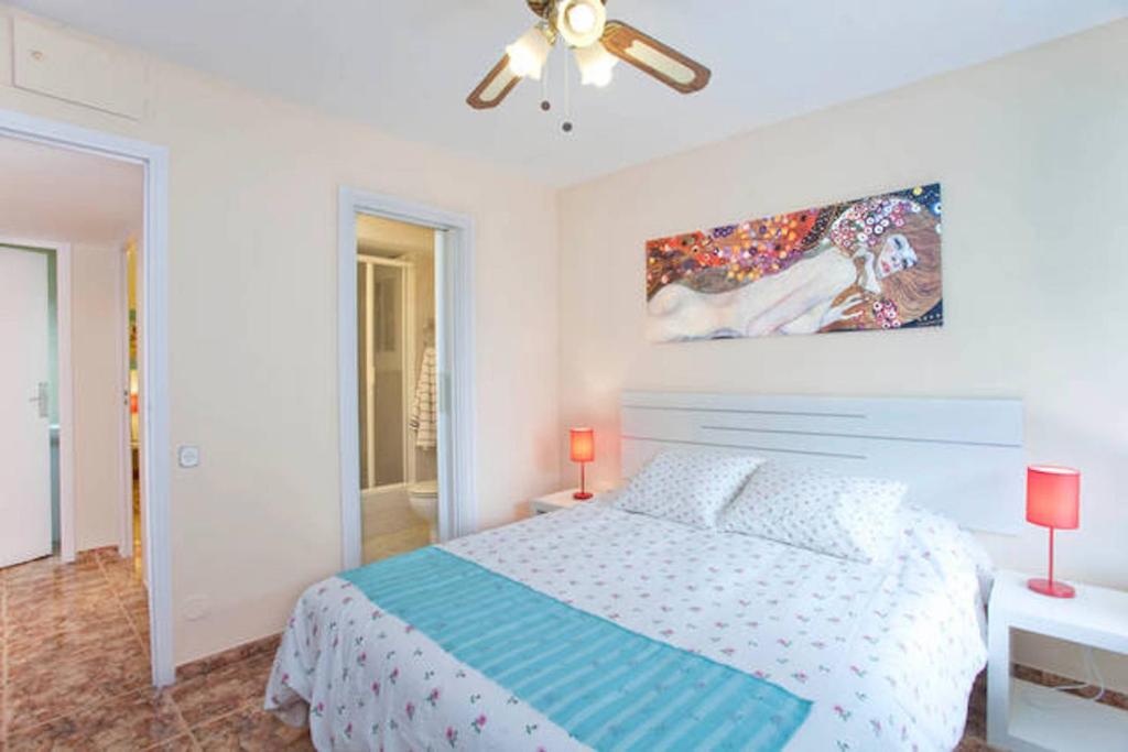 Postel nebo postele na pokoji v ubytování Apartment Llavaneres I