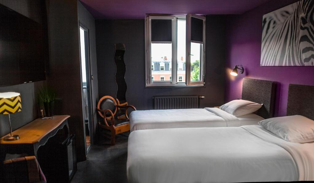 Postel nebo postele na pokoji v ubytování Cit'Hotel B Hotel Brasserie