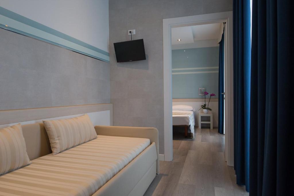 TV a/nebo společenská místnost v ubytování Hotel Colombo