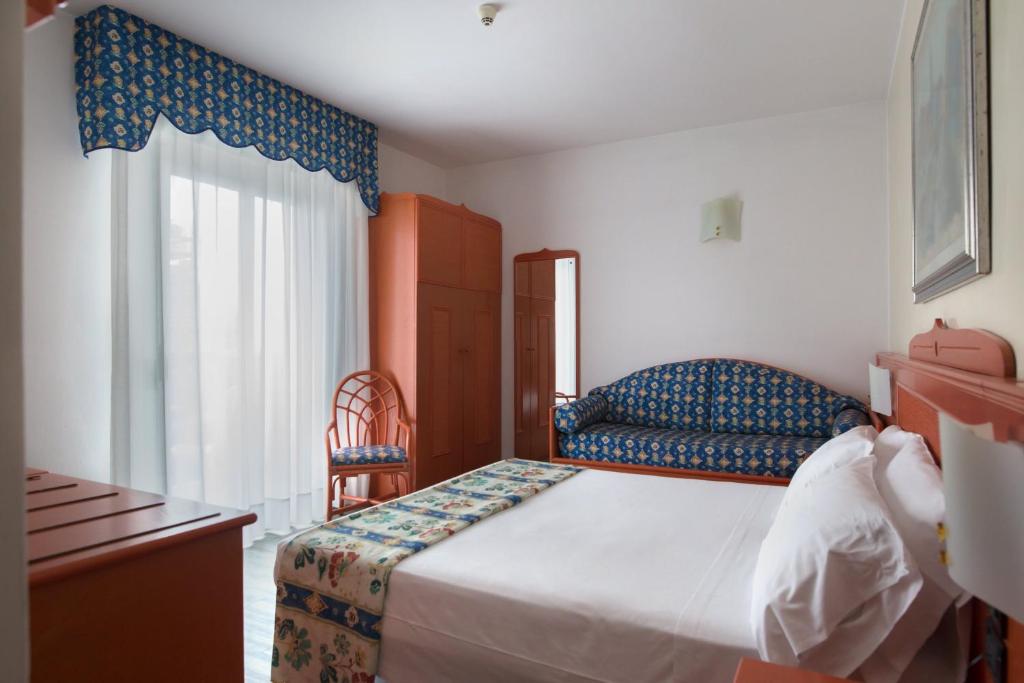 Postel nebo postele na pokoji v ubytování Hotel Brioni Mare