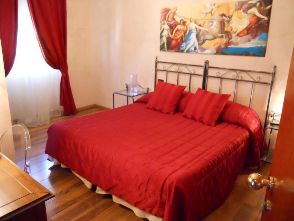 Ein Bett oder Betten in einem Zimmer der Unterkunft Locanda Villa Moderna