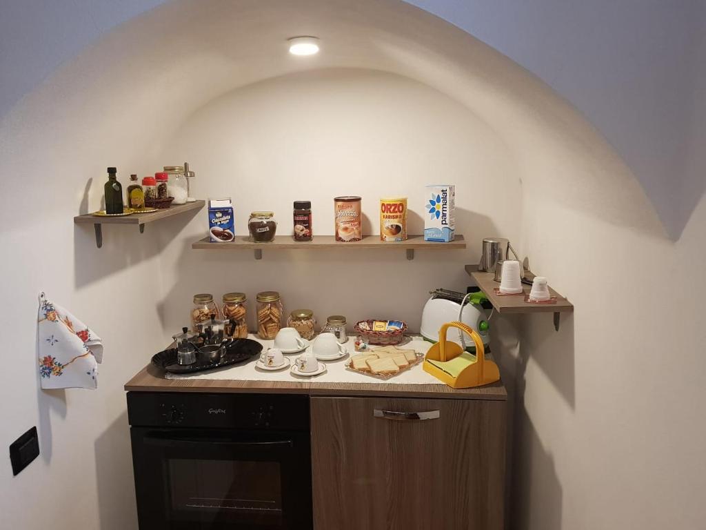 Kuchyň nebo kuchyňský kout v ubytování La Casetta