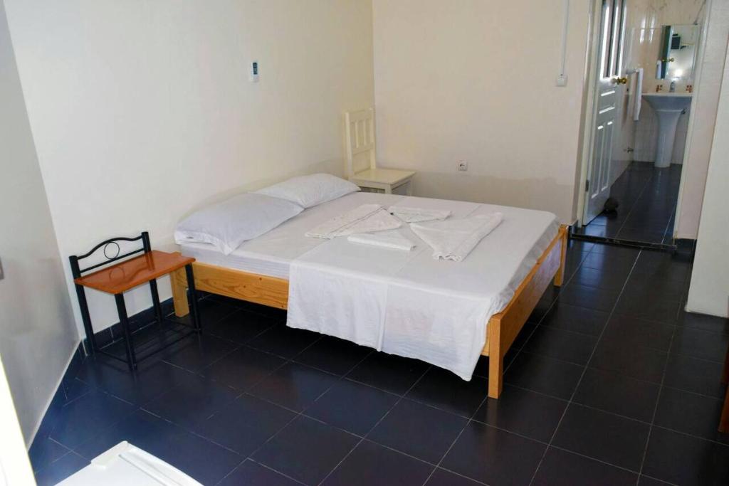 Postel nebo postele na pokoji v ubytování Hotel Miramar Fogo Brava