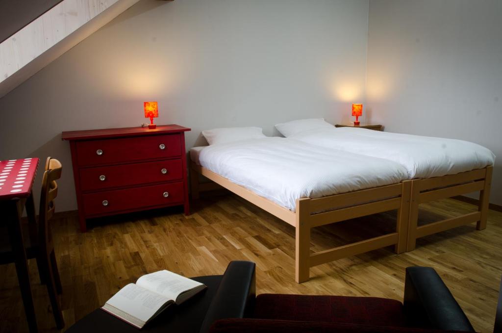 Postel nebo postele na pokoji v ubytování Depot 195 - Hostel Winterthur