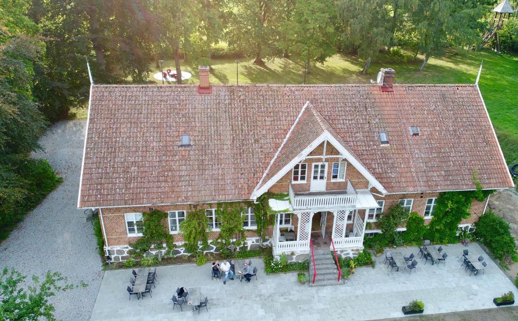 an aerial view of a large house with a roof at Tastecelebration Residence in Andrarum-Brosarp