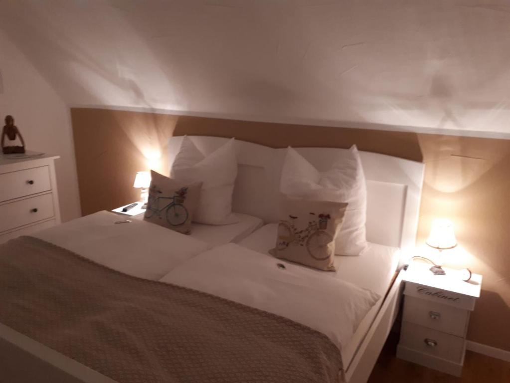 Postel nebo postele na pokoji v ubytování Guest House Dommitzsch