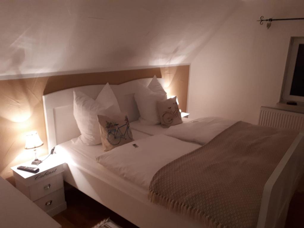 Postel nebo postele na pokoji v ubytování Guest House Dommitzsch