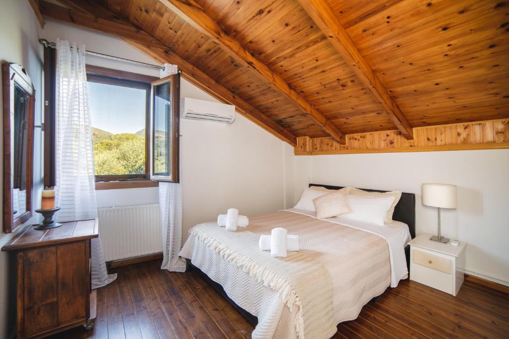 Postel nebo postele na pokoji v ubytování Villa Elea