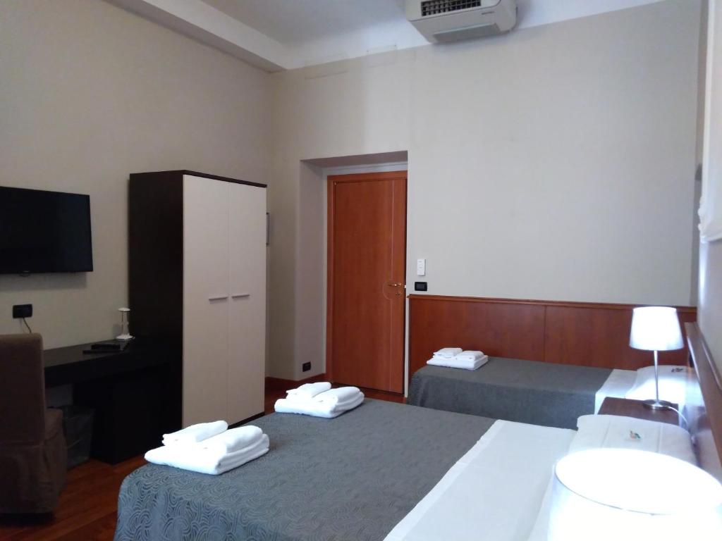 Postel nebo postele na pokoji v ubytování Hotel Twenty Nine
