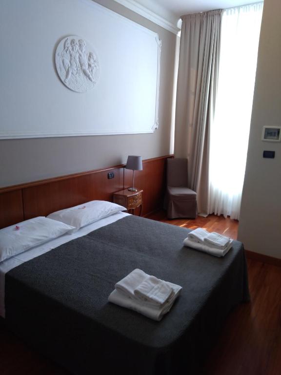 Postel nebo postele na pokoji v ubytování Hotel Twenty Nine