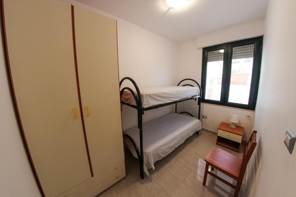 Postel nebo postele na pokoji v ubytování ARIES Case Vacanza