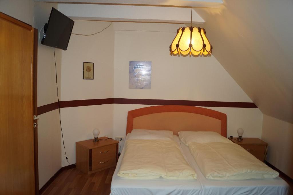 Postel nebo postele na pokoji v ubytování La Fontana