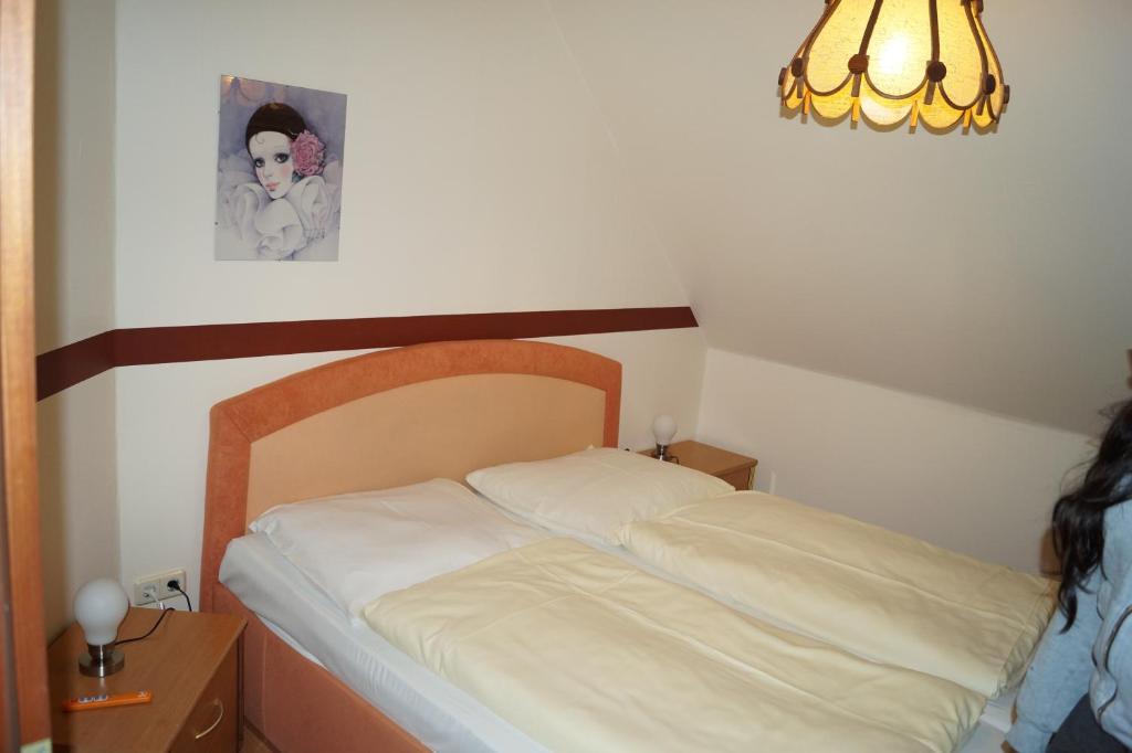 Postel nebo postele na pokoji v ubytování La Fontana