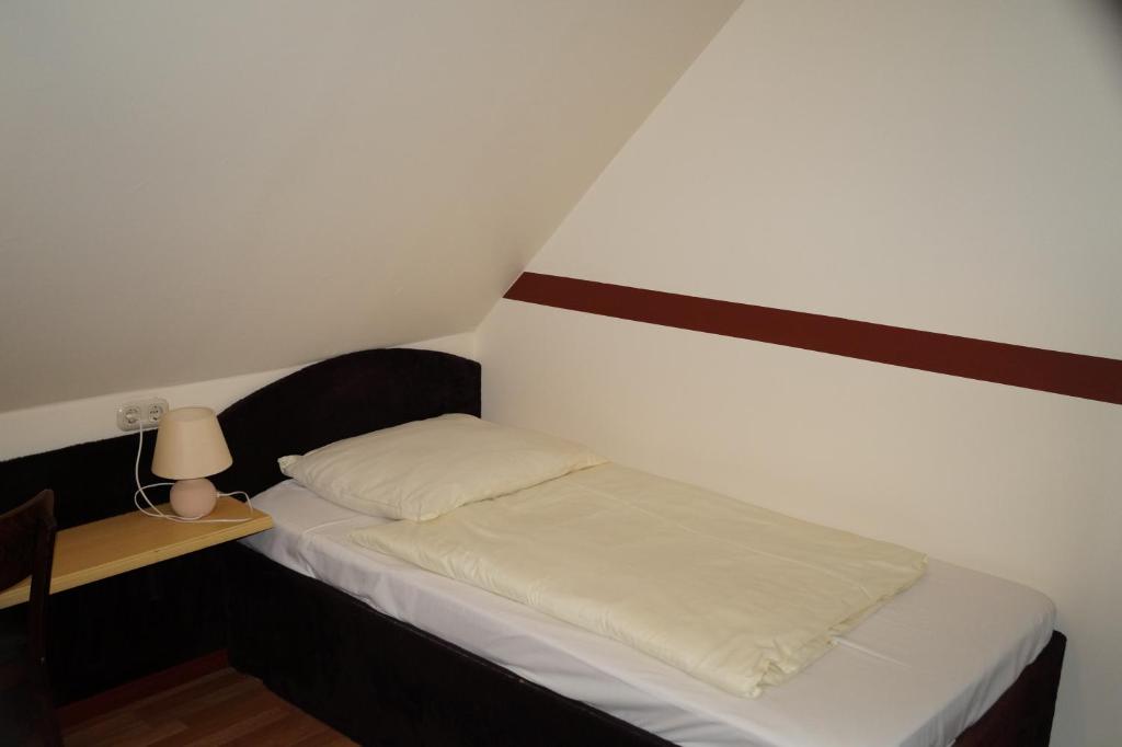 Postel nebo postele na pokoji v ubytování La Fontana