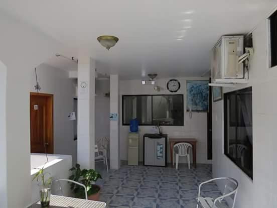 Kuchyň nebo kuchyňský kout v ubytování Hostal Insular