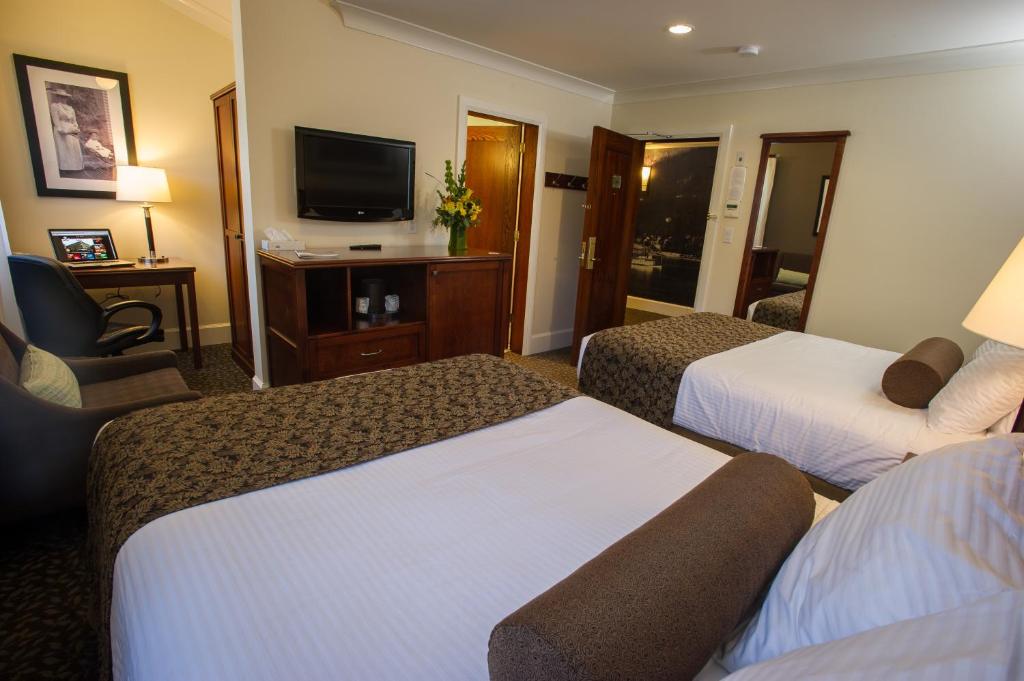 Postel nebo postele na pokoji v ubytování Hume Hotel & Spa