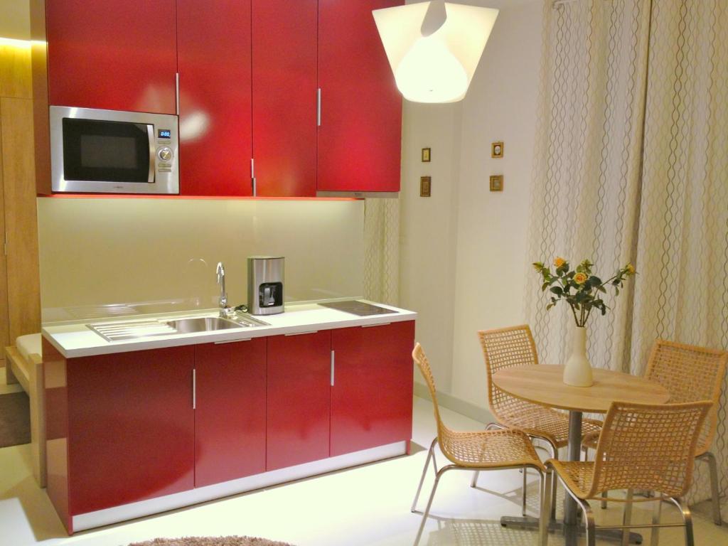 Кухня или мини-кухня в Grace Rooms and Apartments Budapest
