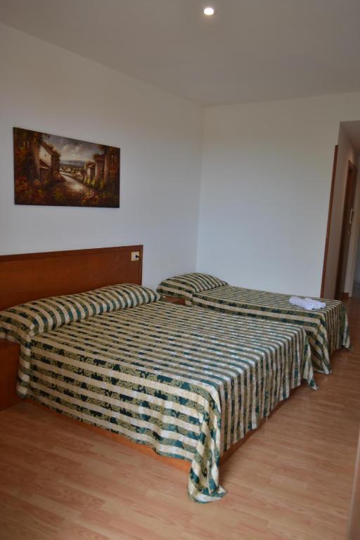 Postel nebo postele na pokoji v ubytování Hotel Nicolaj
