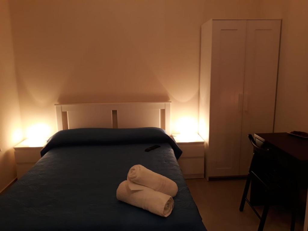 Postel nebo postele na pokoji v ubytování Il gelsomino