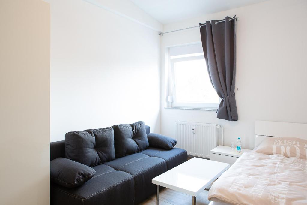 Postel nebo postele na pokoji v ubytování Holidayapartment Rüsselsheim