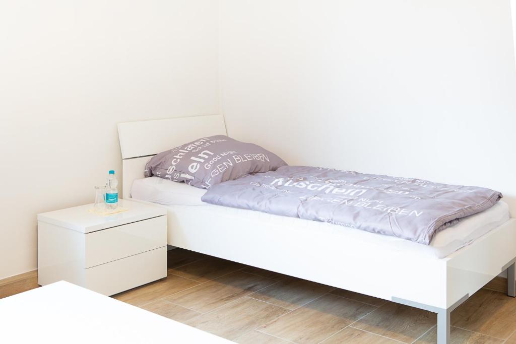 Postel nebo postele na pokoji v ubytování Holidayapartment Rüsselsheim