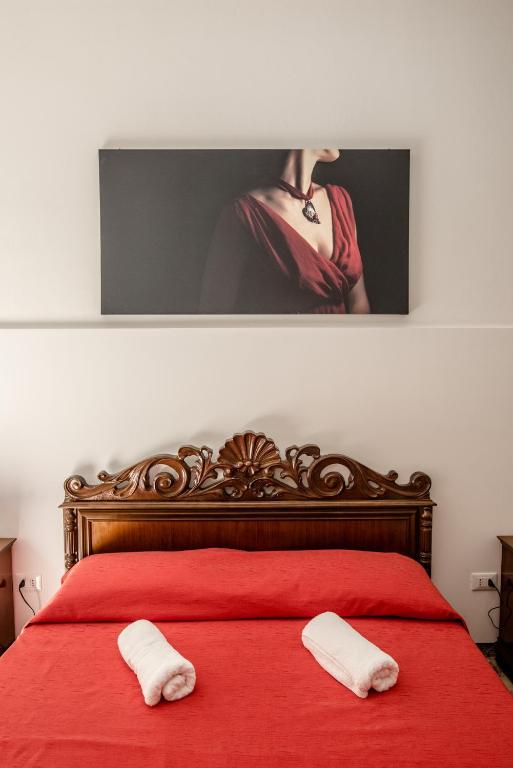 Posteľ alebo postele v izbe v ubytovaní Carlentini house B&B