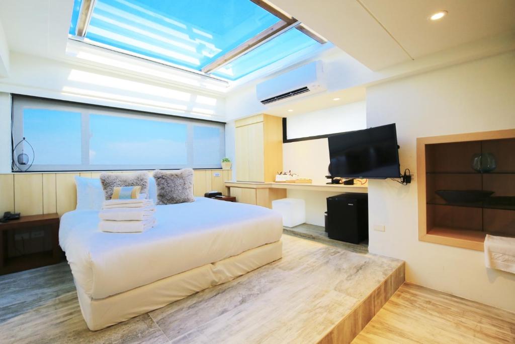 TV a/nebo společenská místnost v ubytování Laguna Villas & Resorts