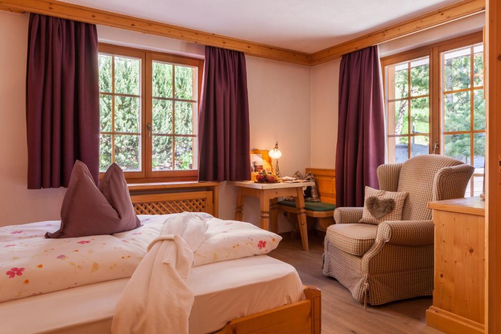 Postel nebo postele na pokoji v ubytování Hotel Berghof