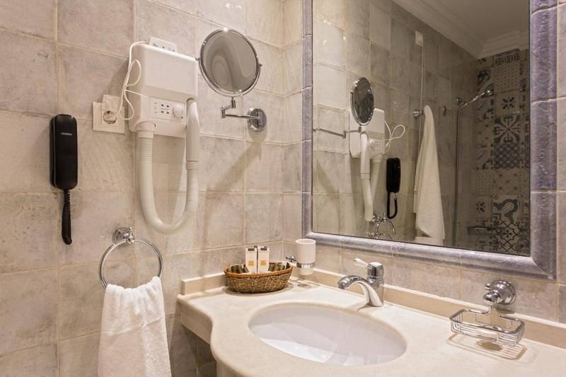A bathroom at Therma Palace - All inclusive & Private Beach & Free Parking