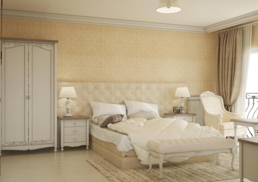 A bed or beds in a room at Therma Palace - All inclusive & Private Beach & Free Parking