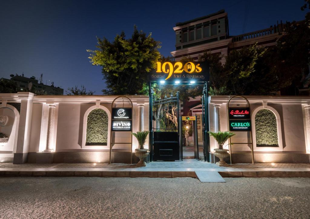 an open door to a store at night at 1920s Boutique Hotel and Restaurants in Cairo