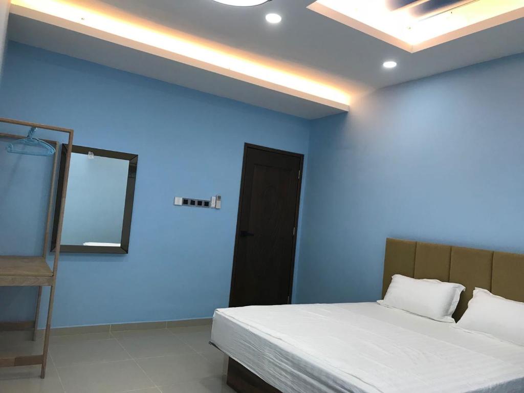 Postel nebo postele na pokoji v ubytování Homestay Stardow~星窗名宿~