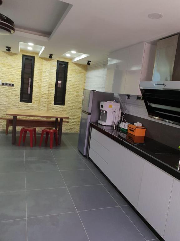 Kuchyň nebo kuchyňský kout v ubytování Homestay Stardow~星窗名宿~
