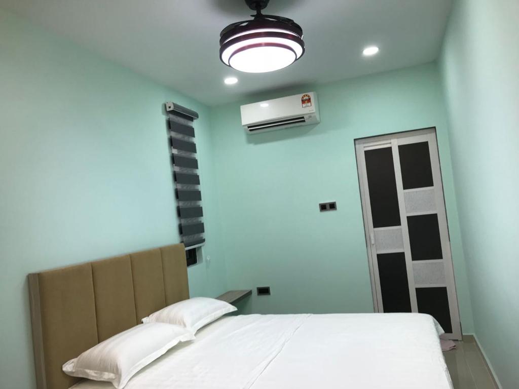 Postel nebo postele na pokoji v ubytování Homestay Stardow~星窗名宿~