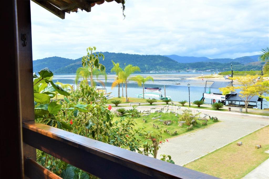 a view of the beach from a balcony at Pousada do Imperador in Paraty