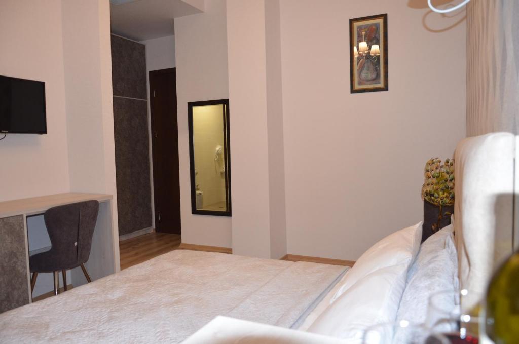 TV a/nebo společenská místnost v ubytování Hotel Griboedov