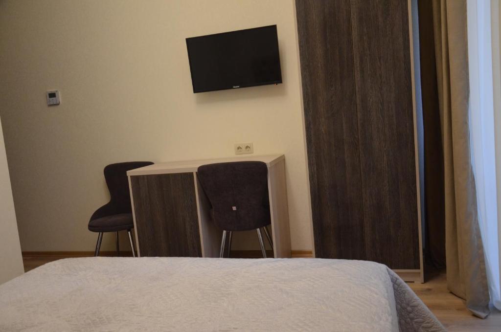 TV a/nebo společenská místnost v ubytování Hotel Griboedov