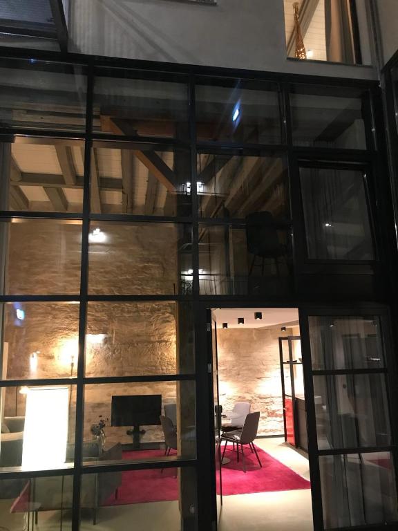 Postel nebo postele na pokoji v ubytování Fisher's Loft Hotel